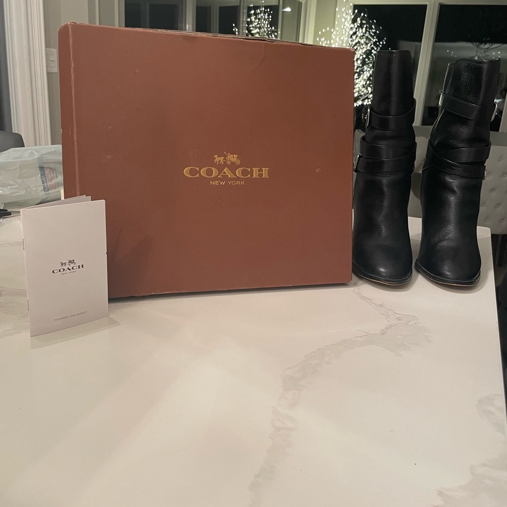 Coach, Alexandra pull on boots